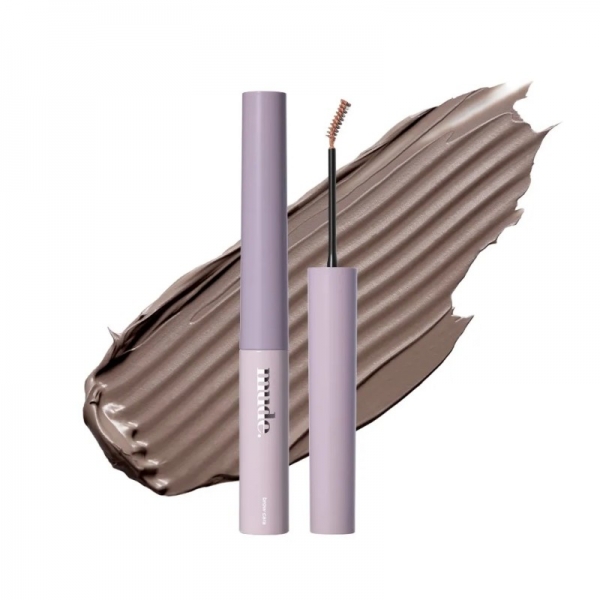 眉毛ケア製品の画像。製品は紫色のチューブで、茶色の眉毛ジェルが塗布されています。