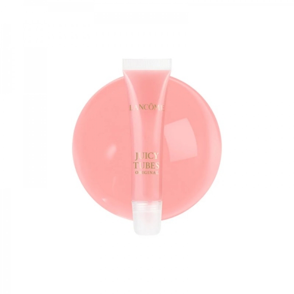 ランコムのジューシーチューブのリップグロスが、ピンク色の円の上に乗せられた写真です。