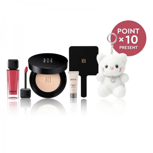 HERAのコスメセットの画像。クッションファンデ、リップグロス、ハンドミラー、下地、キーホルダーの白猫ぬいぐるみ。赤い丸いバナーに「POINT x 10 PRESENT」と書かれている。