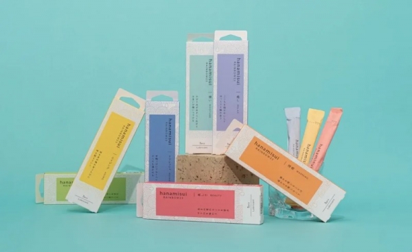 様々な種類のローションのパッケージが並べられた写真。様々な色とフレーバーがあり、それぞれ異なる効果を謳っている。